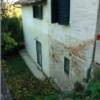 View of wall Rudy Guede scaled to gain entrance to the cottage